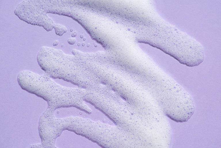soap on purple background